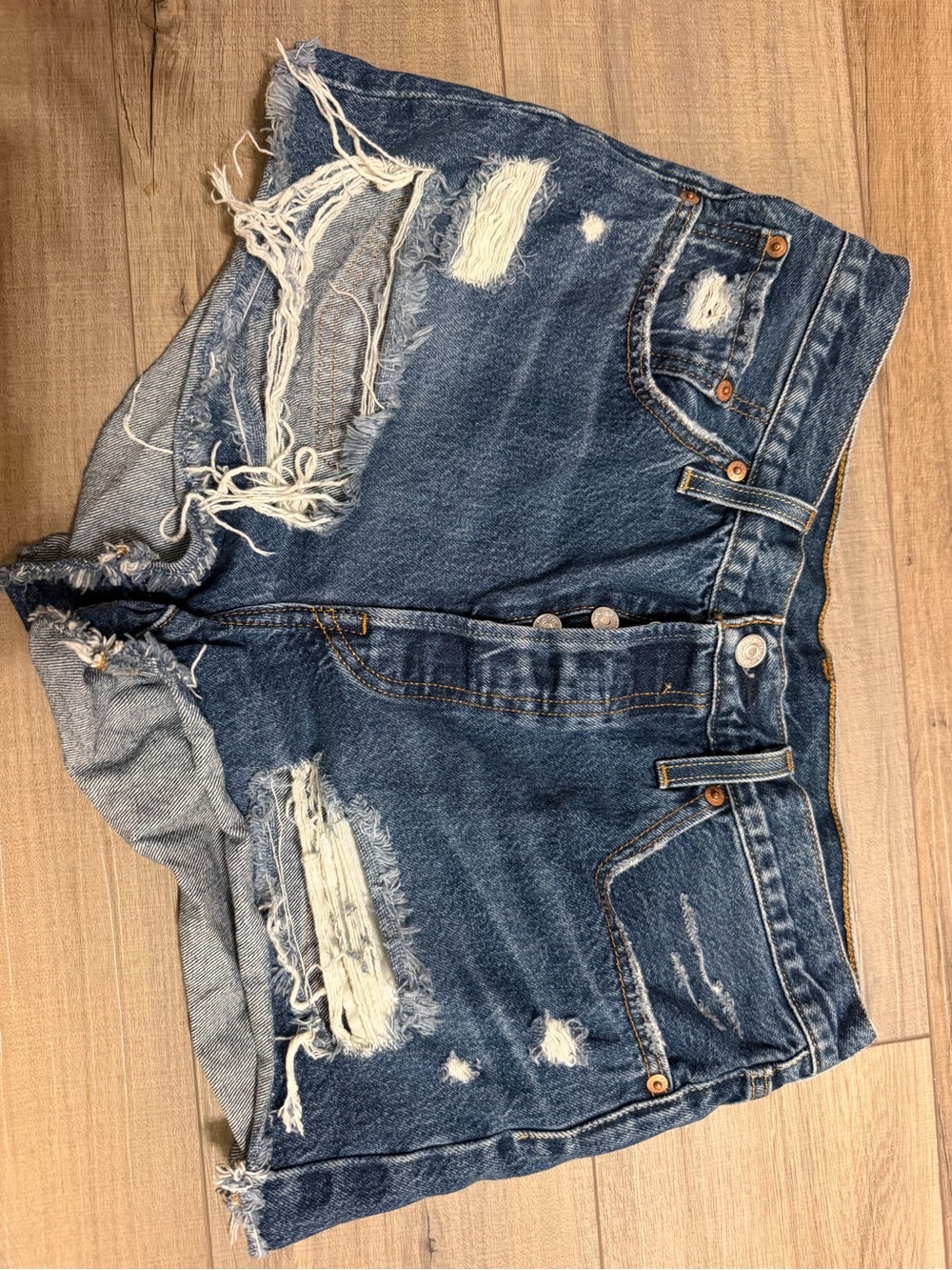 Levi's Distressed Dark Blue Denim Cutoff Shorts